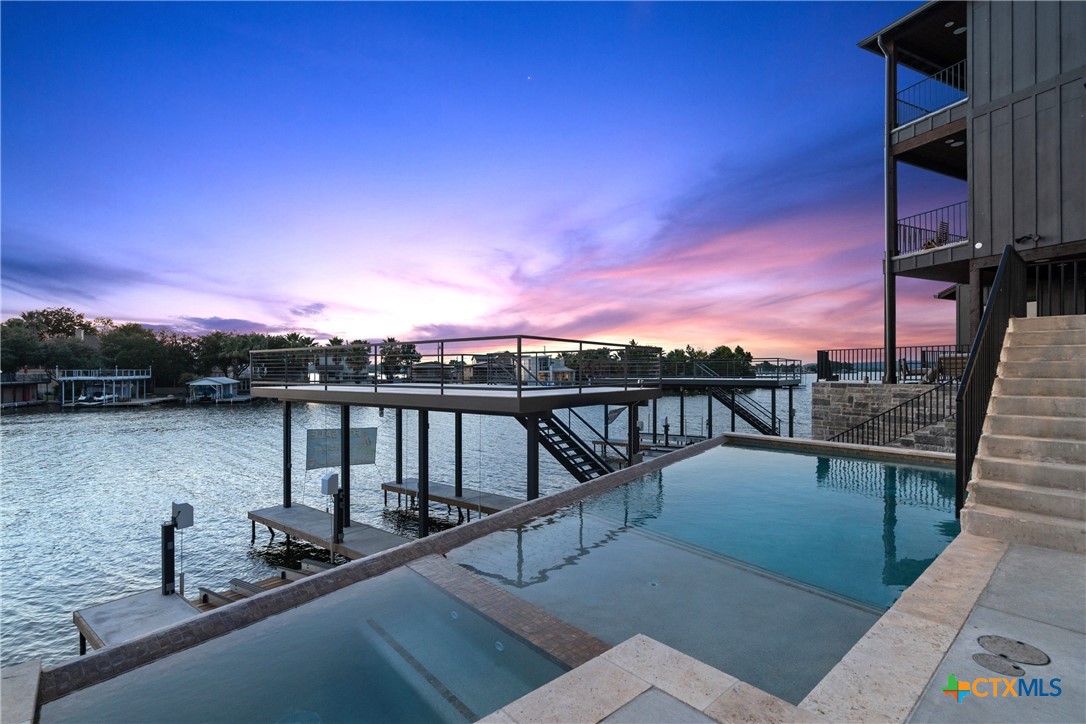 a view of a lake from a balcony