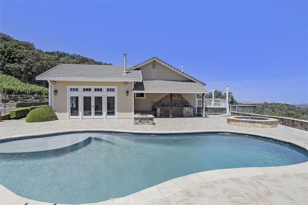 a view of a house with a swimming pool