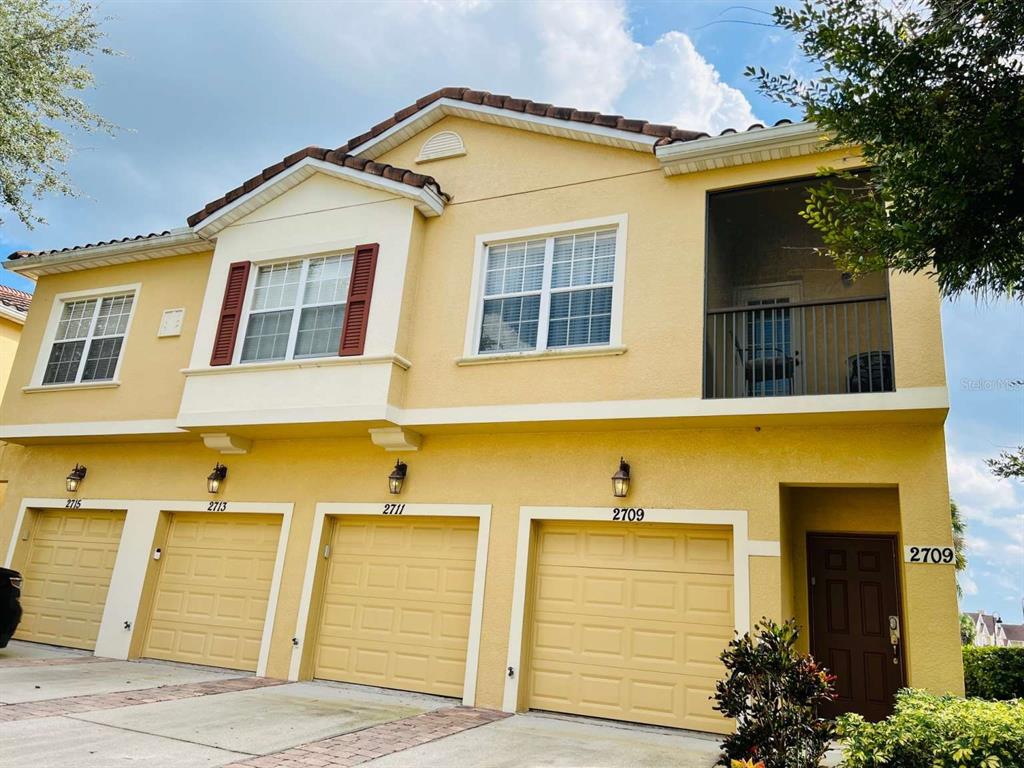 a front view of a house having yard