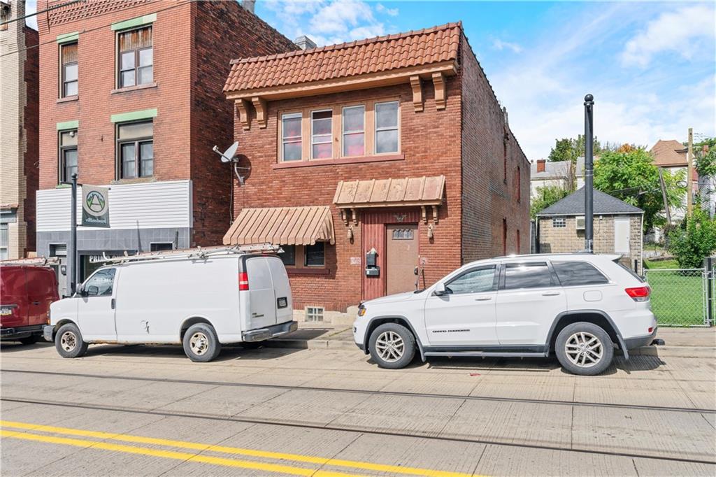 a car parked in front of a house