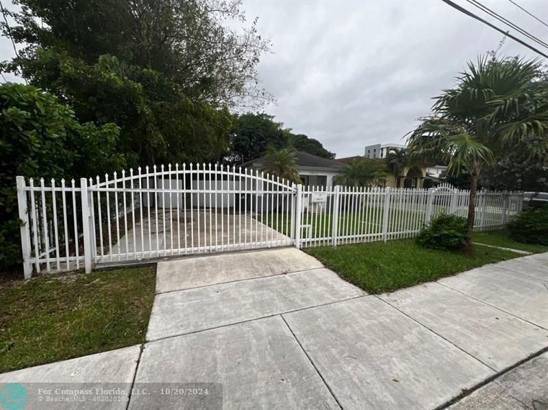 a view of a backyard with a garden