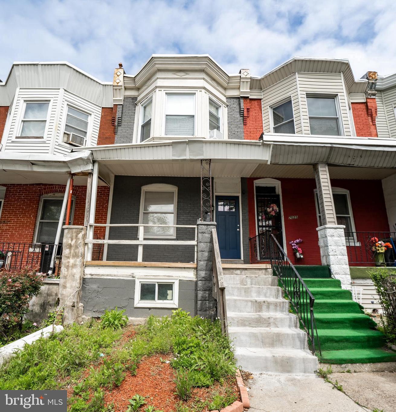 a front view of a multi story residential apartment building