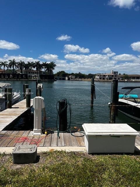 a view of a lake with couches