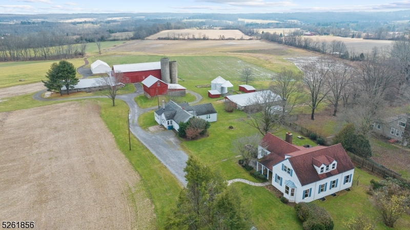 an aerial view of a house with outdoor space