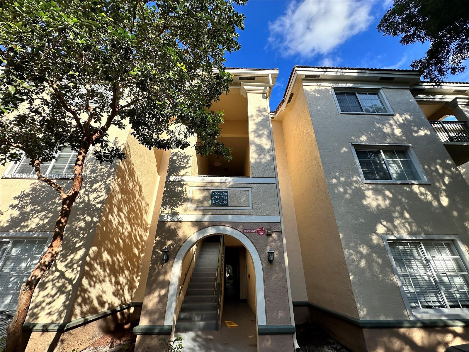 a view of a house with a garage