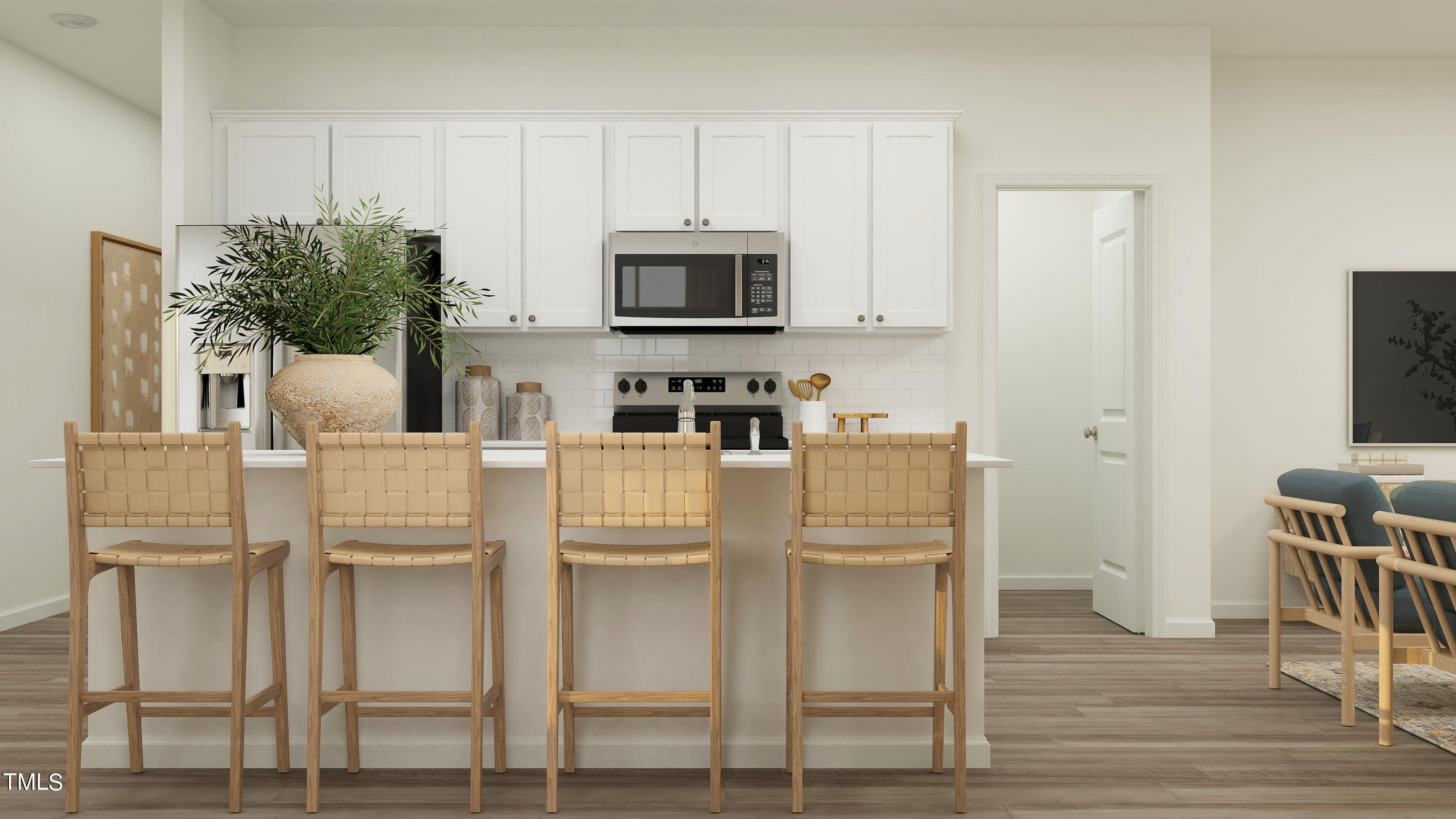 a kitchen with stainless steel appliances granite countertop a white cabinets and a stove top oven