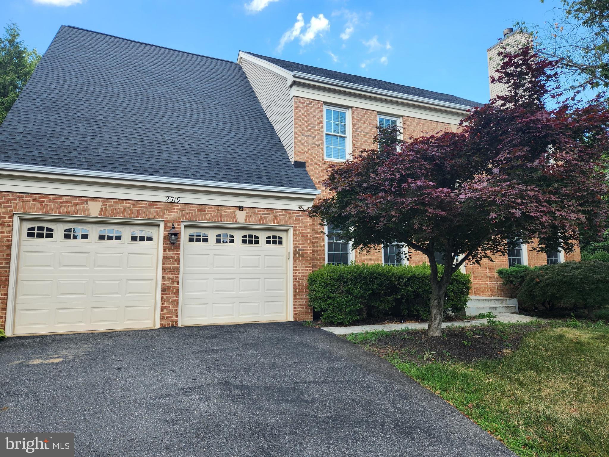 a front view of house with yard