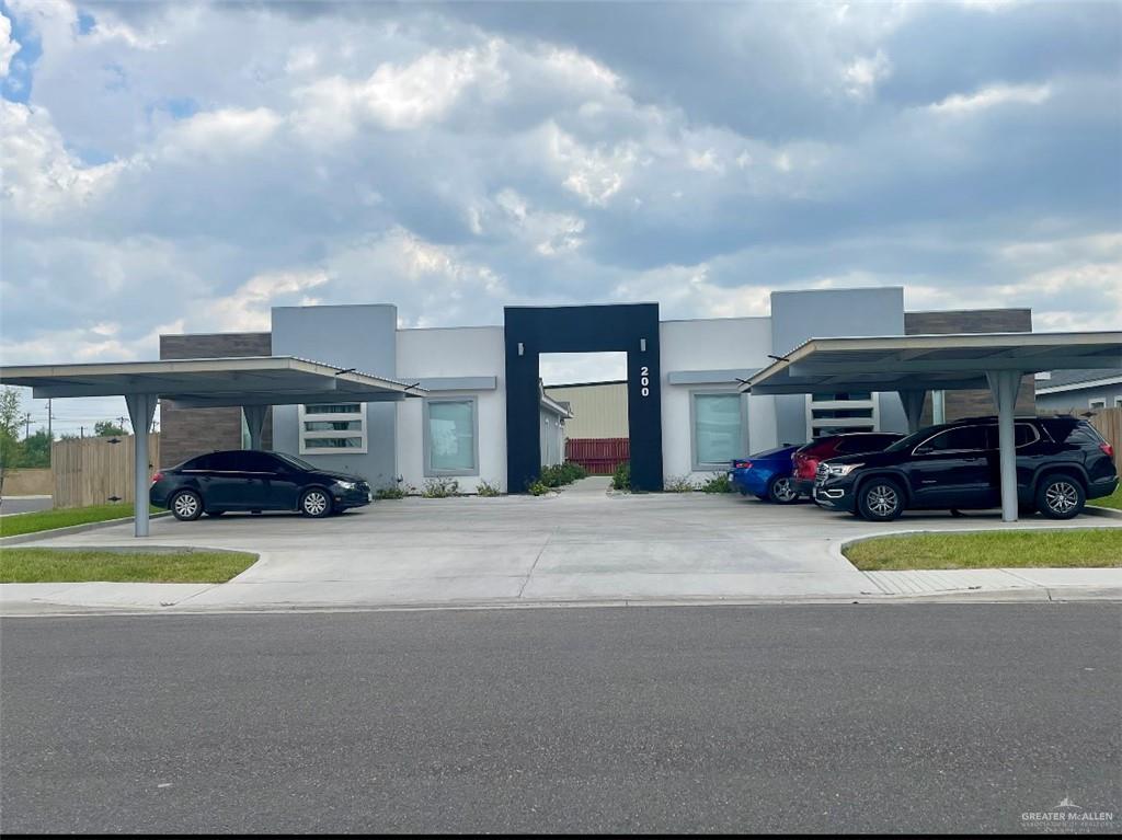 a view of a car parked in front of a building