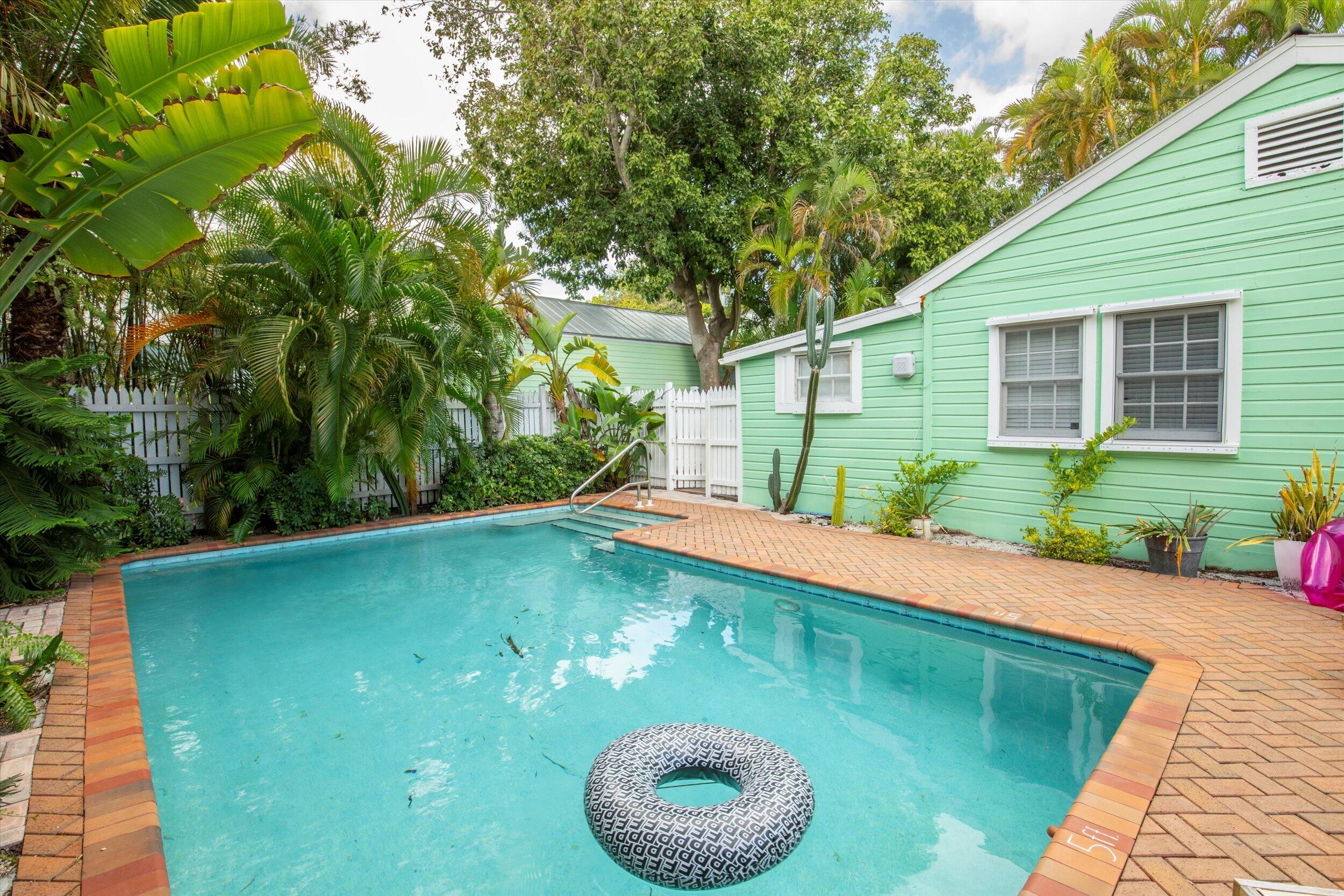 a view of a backyard with a garden