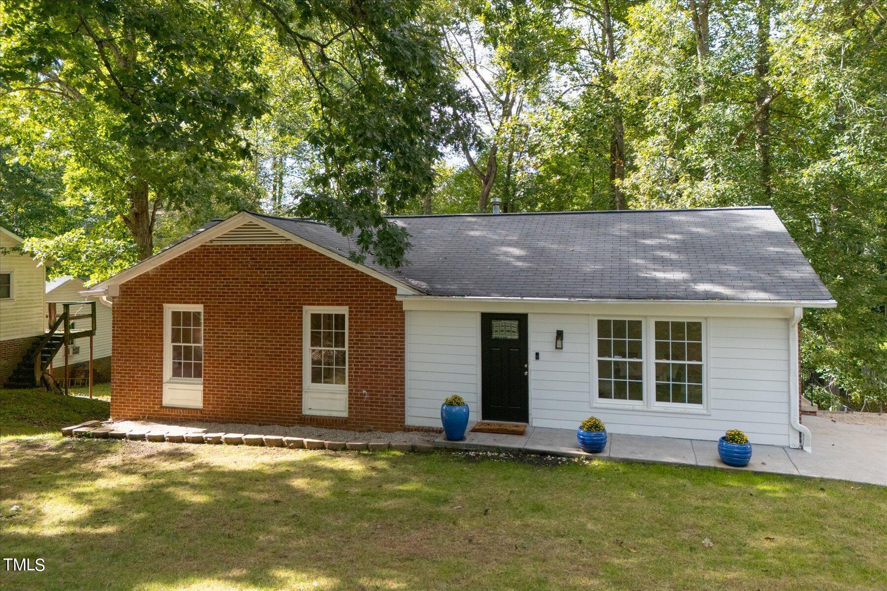 a house view with a garden space