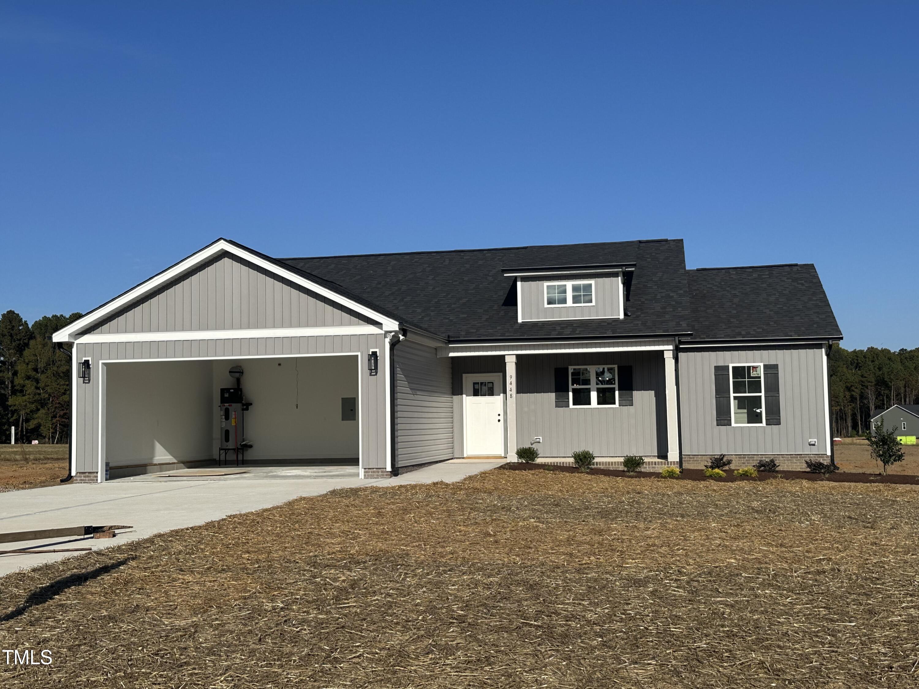 a front view of a house with yard