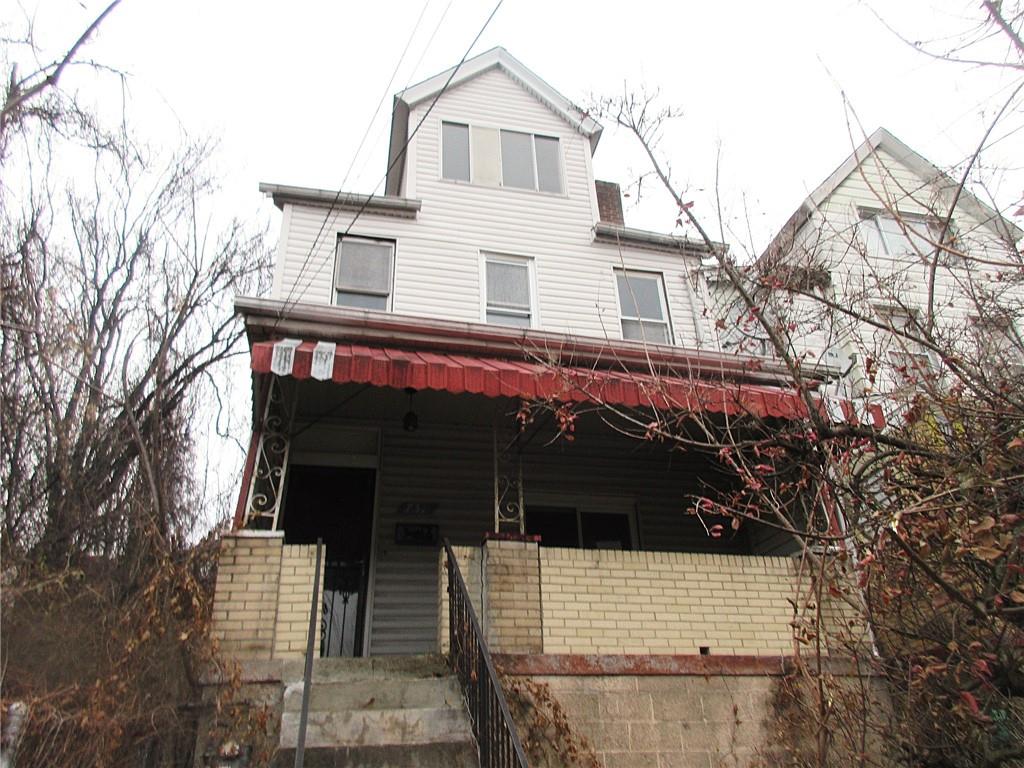 a view of house with a street