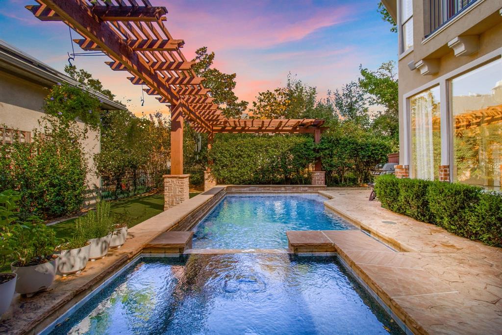 a view of swimming pool with a patio