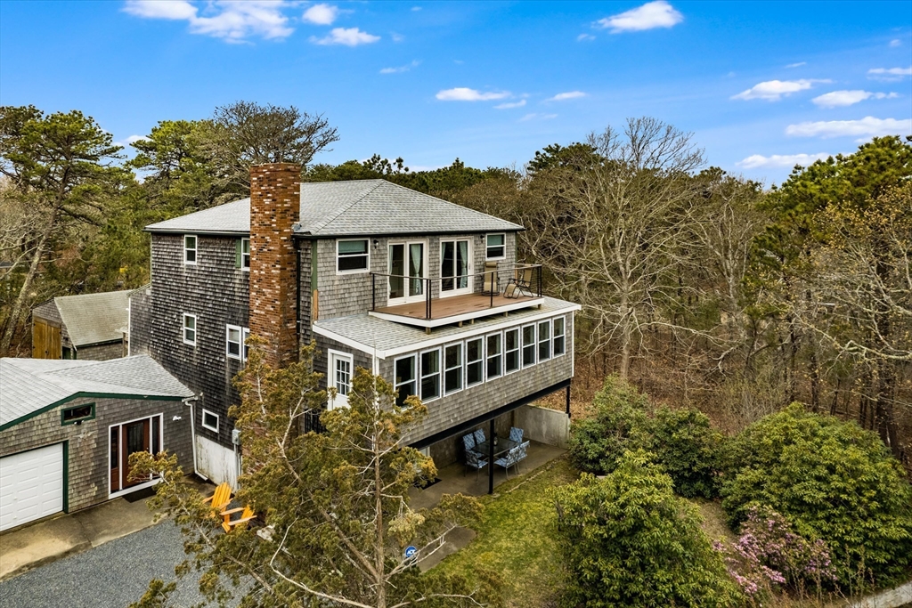 a view of a house with a roof deck