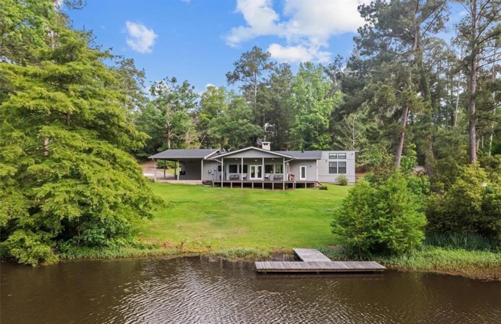 a wooden deck with lake view