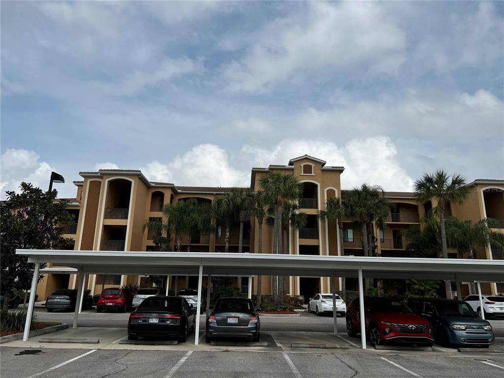 a front view of building with street