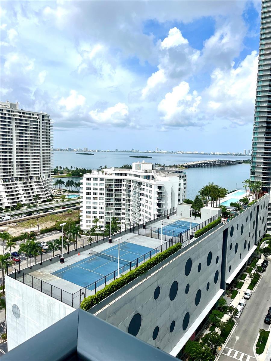 a view of a balcony with city view