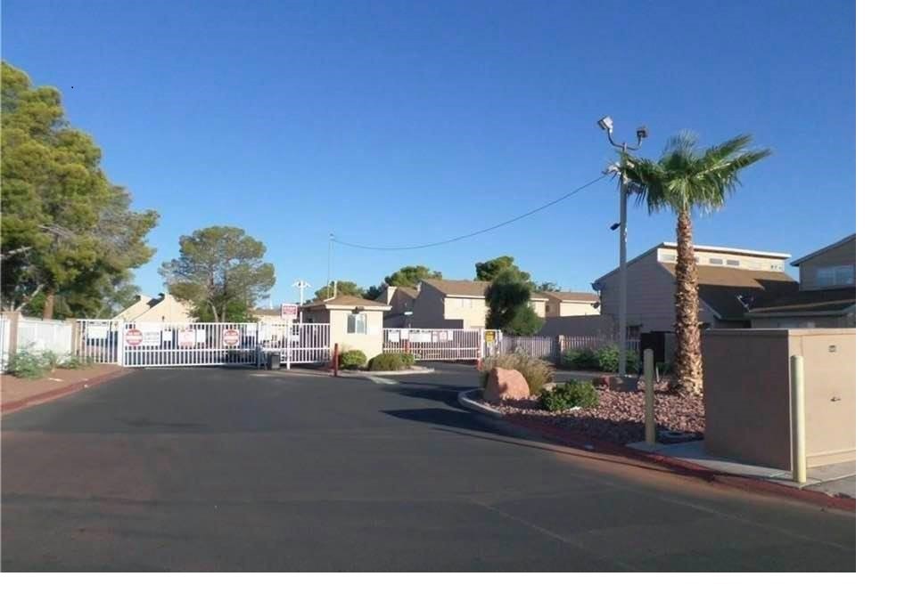 a view of a street with a house in it