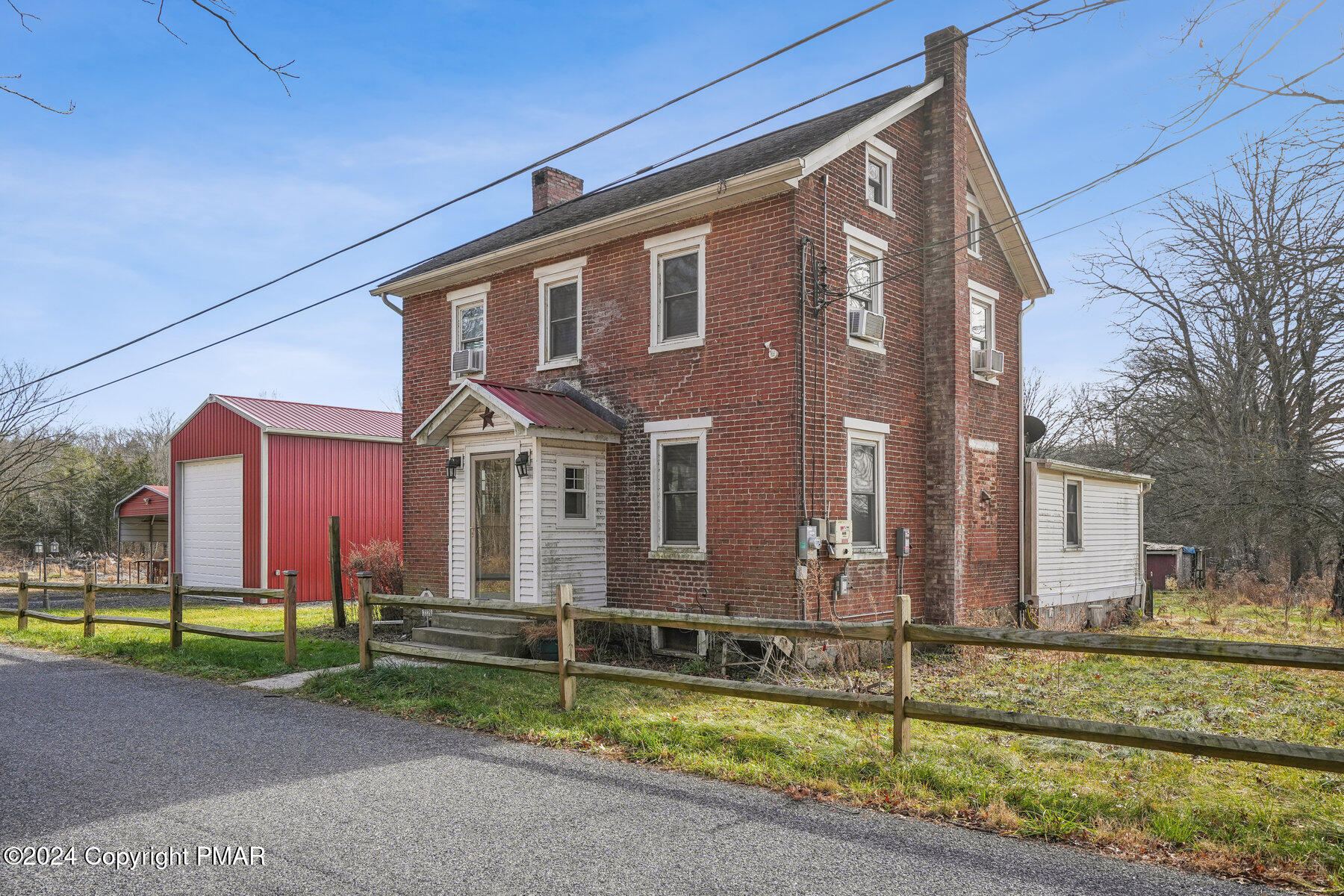 a front view of house with a yard