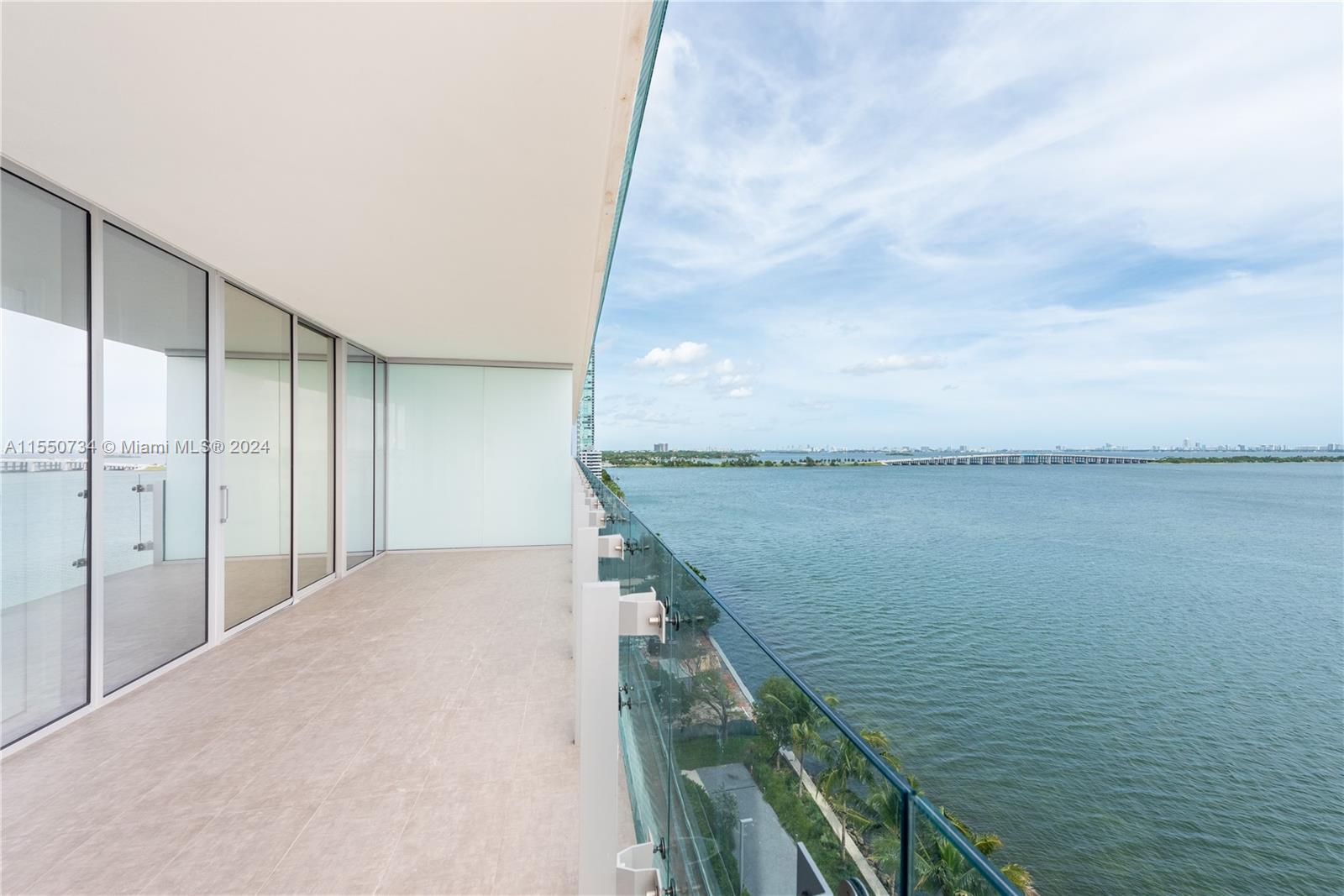 a balcony with an ocean view