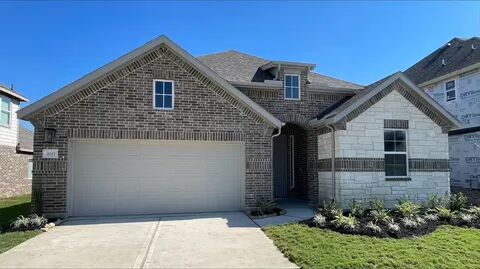 Front of property featuring a garage