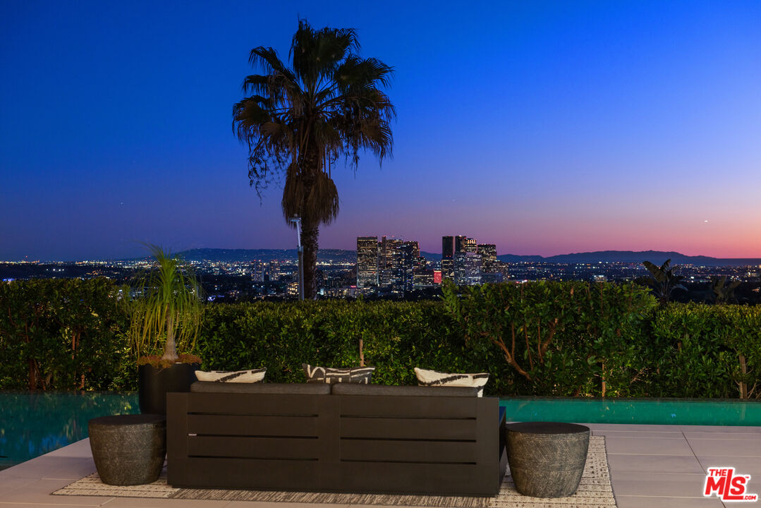 a view of a bench in front of a building