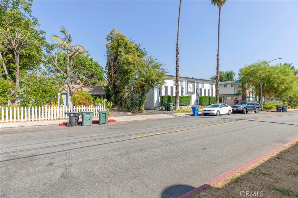 a view of a street with cars