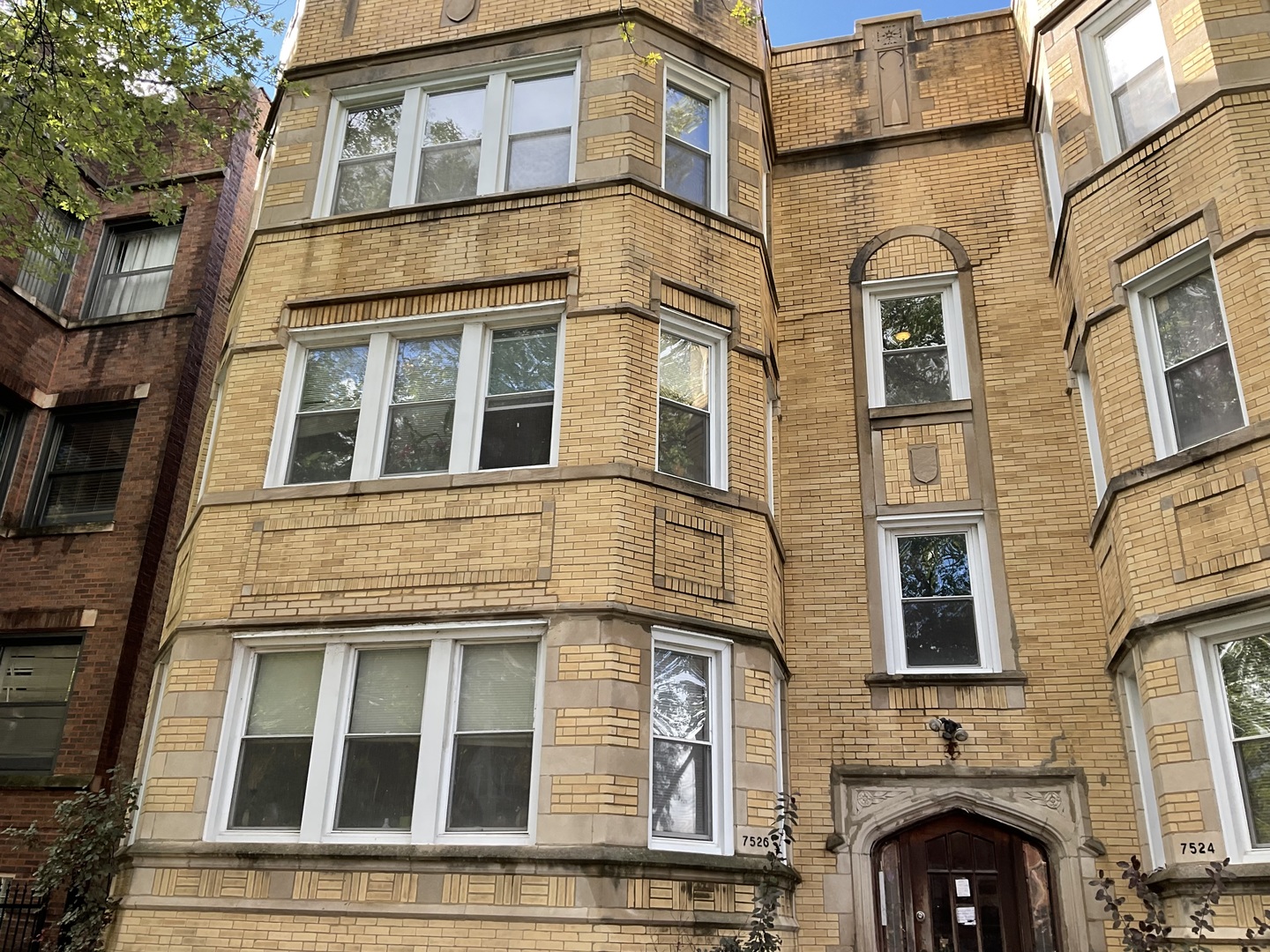 a front view of a multi story residential apartment building