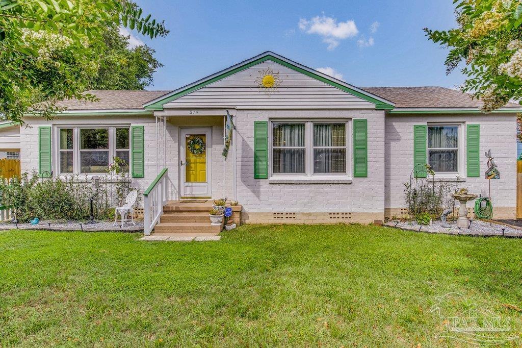 front view of a house with a yard