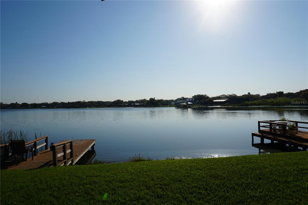 a view of a lake with a big yard