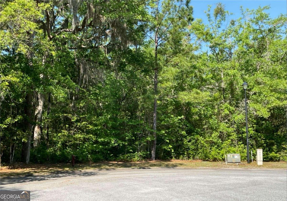 a view of a house with a tree