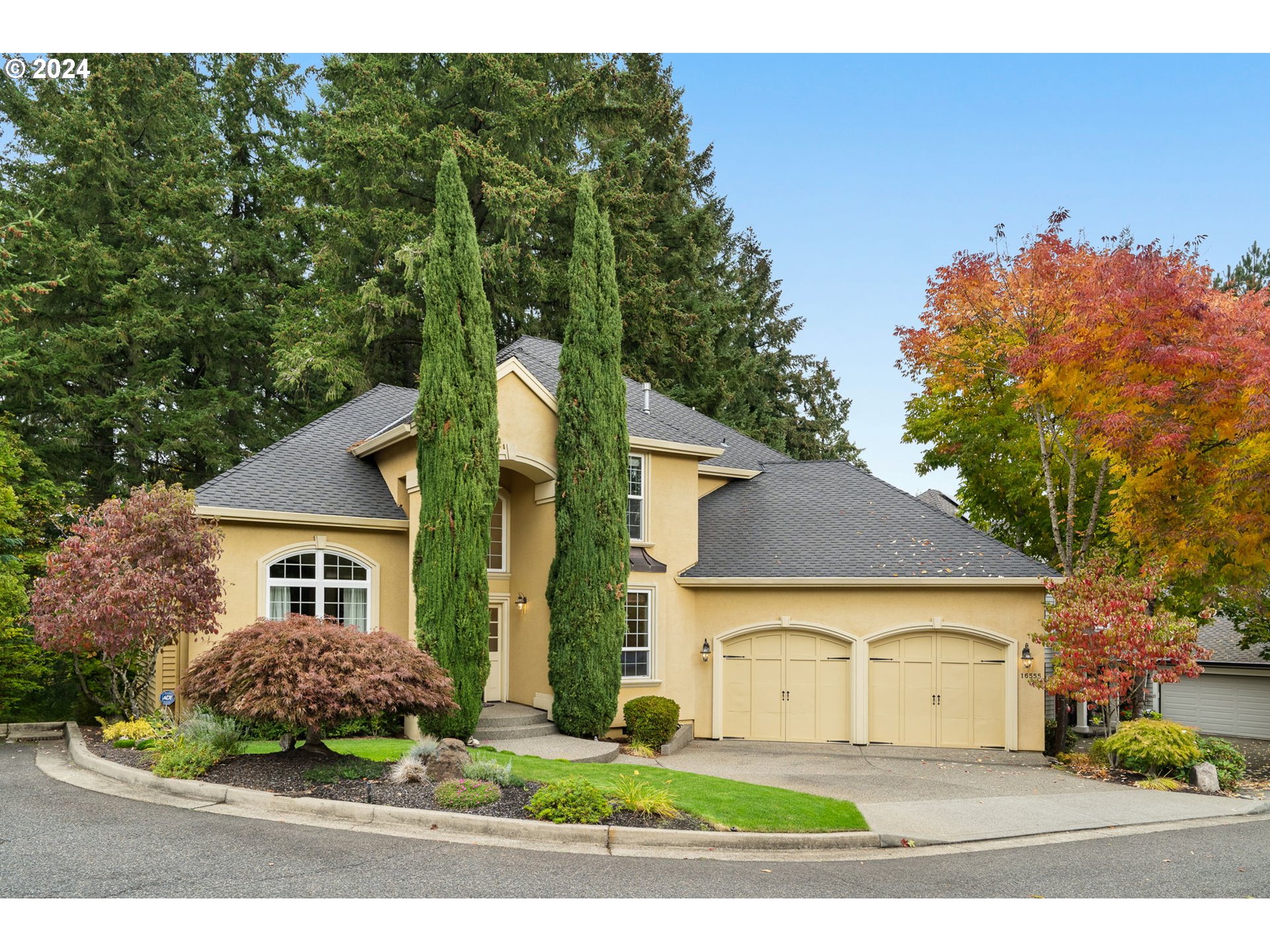 front view of a house with a small yard