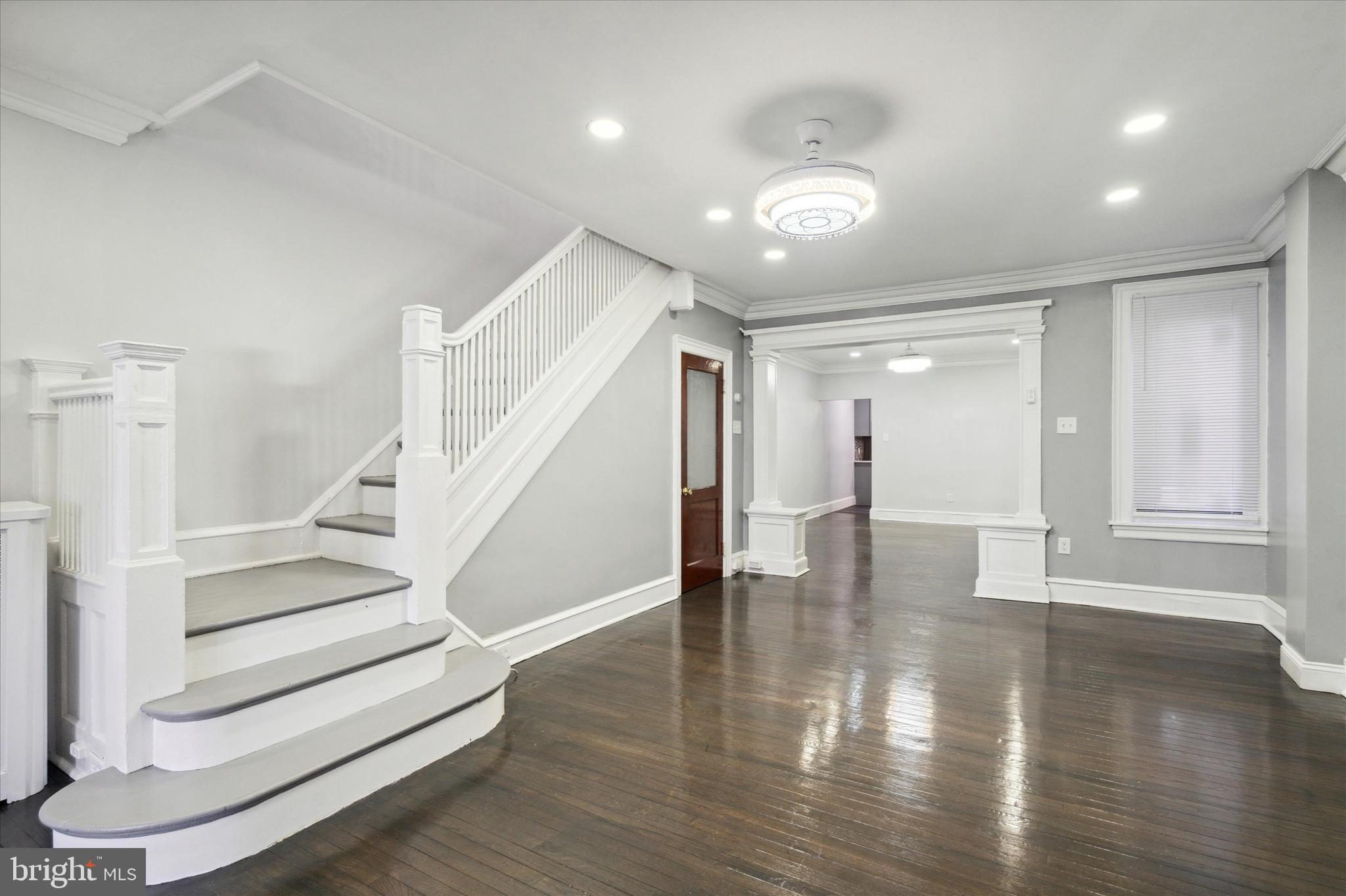 a view of entryway with wooden floor