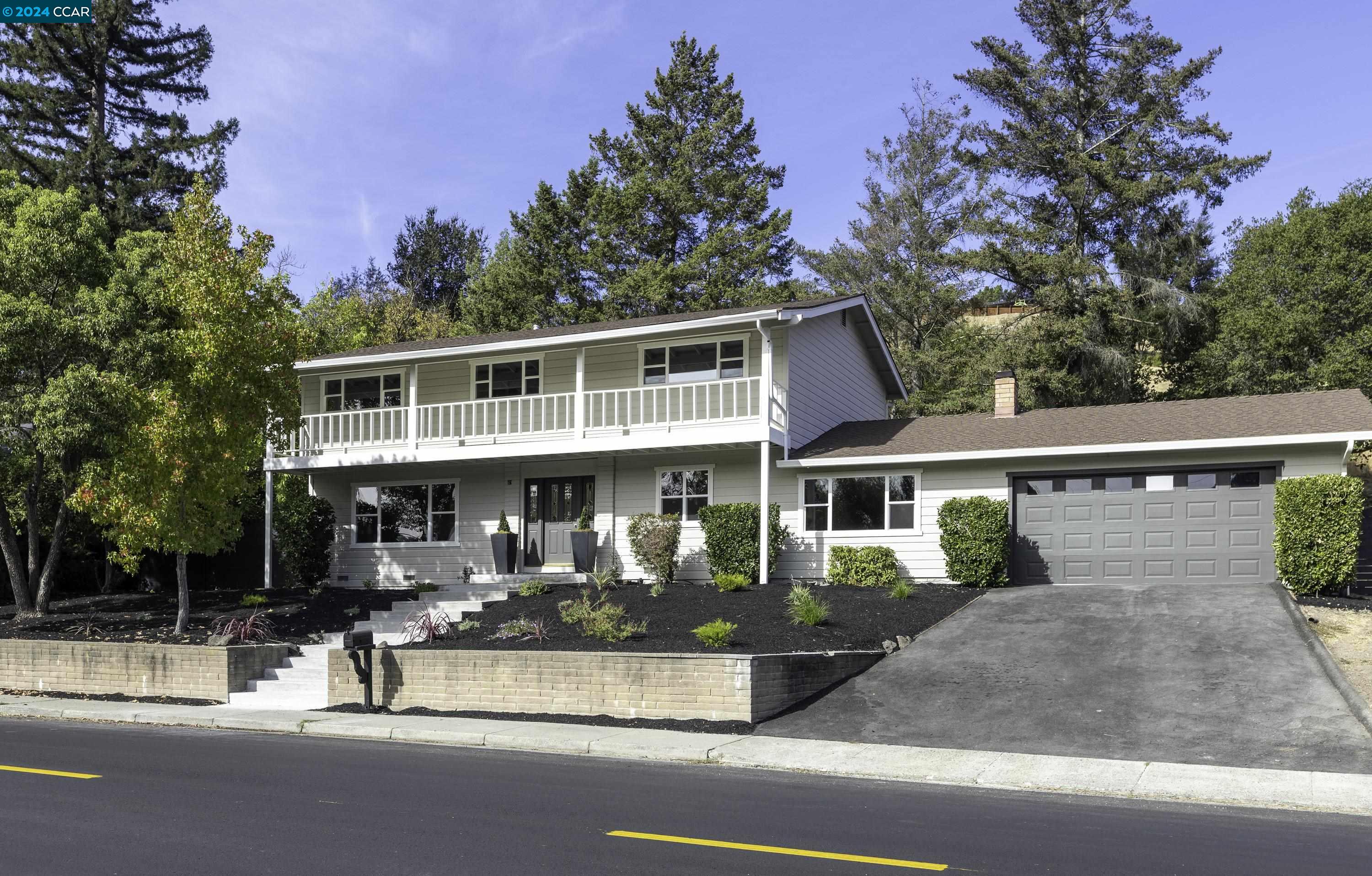 a front view of a house with porch