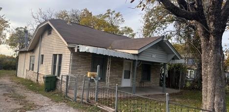 a front view of a house with yard