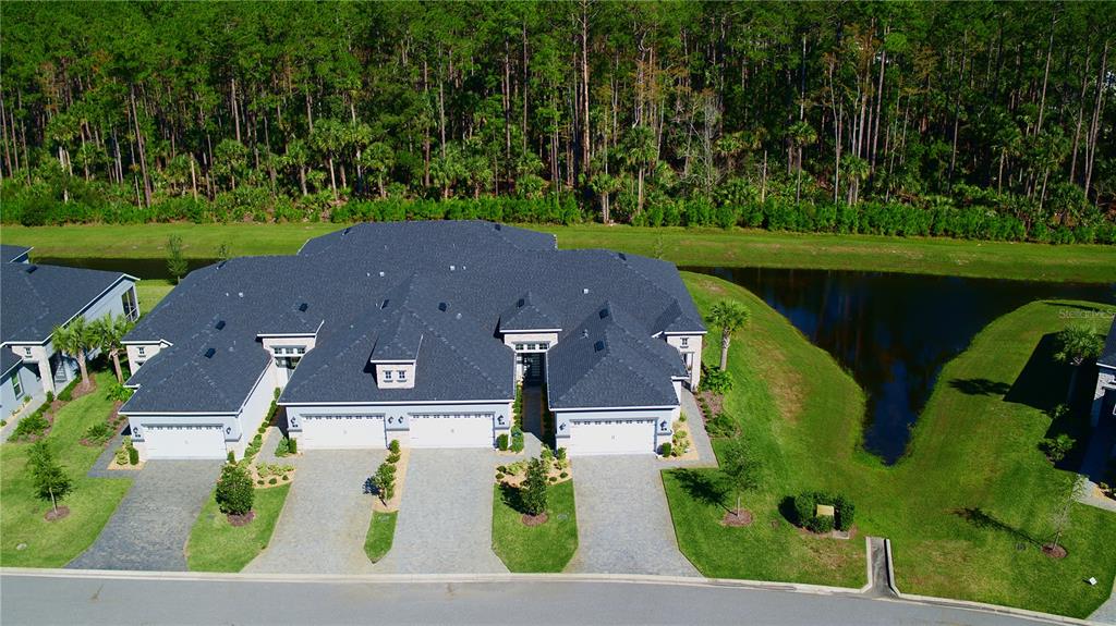 an aerial view of a house with a garden