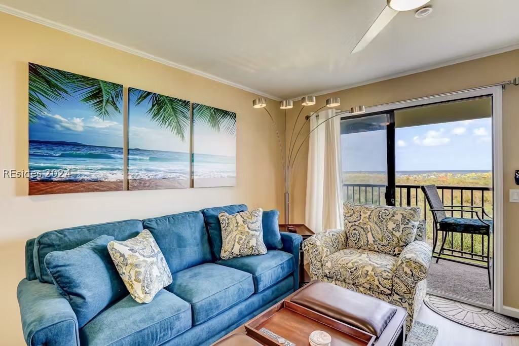 Living room with sleeper sofa and an ocean view