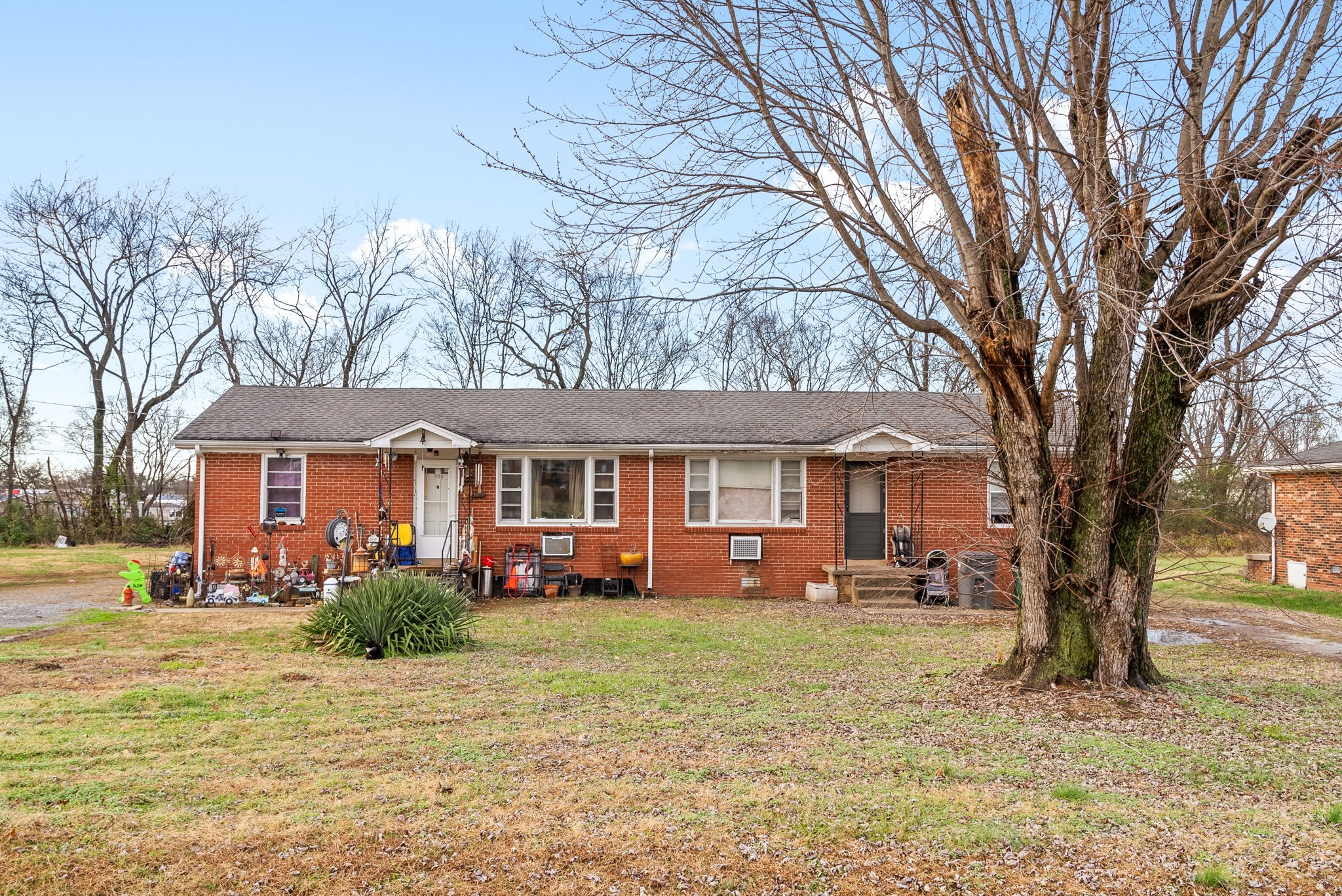 a front view of a house with a yard