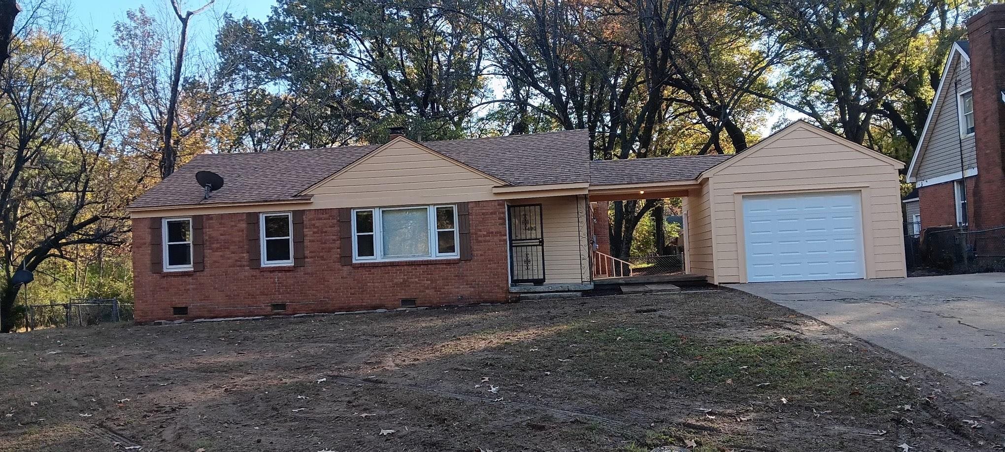 Single story home with a garage