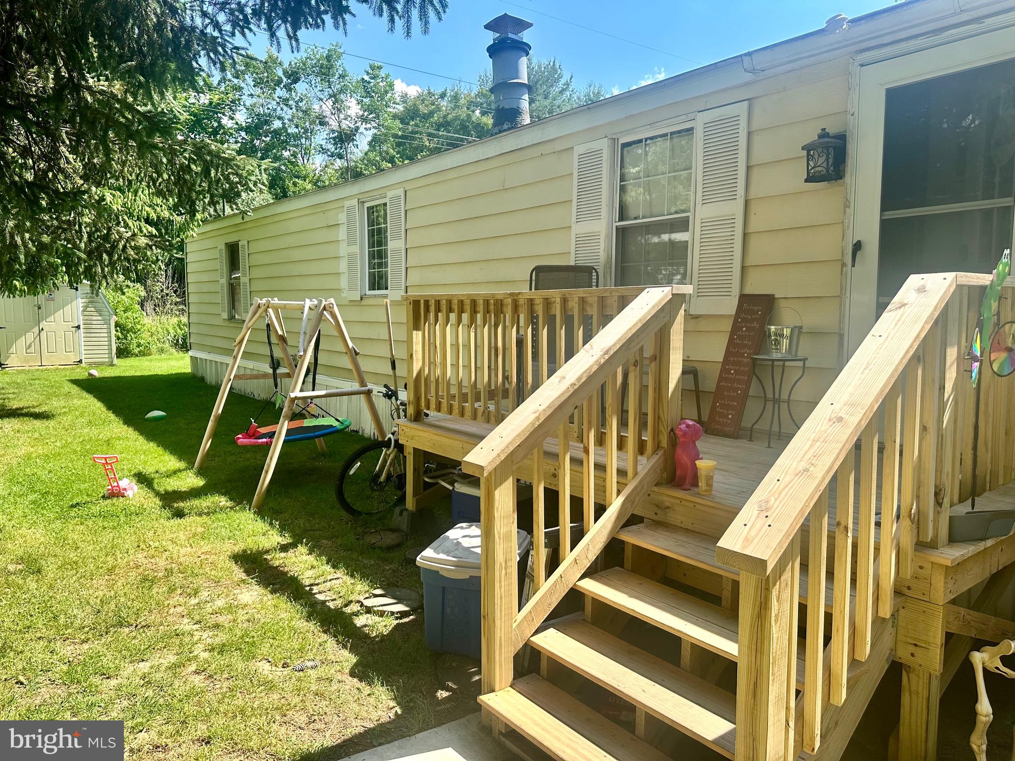 a view of deck with a backyard