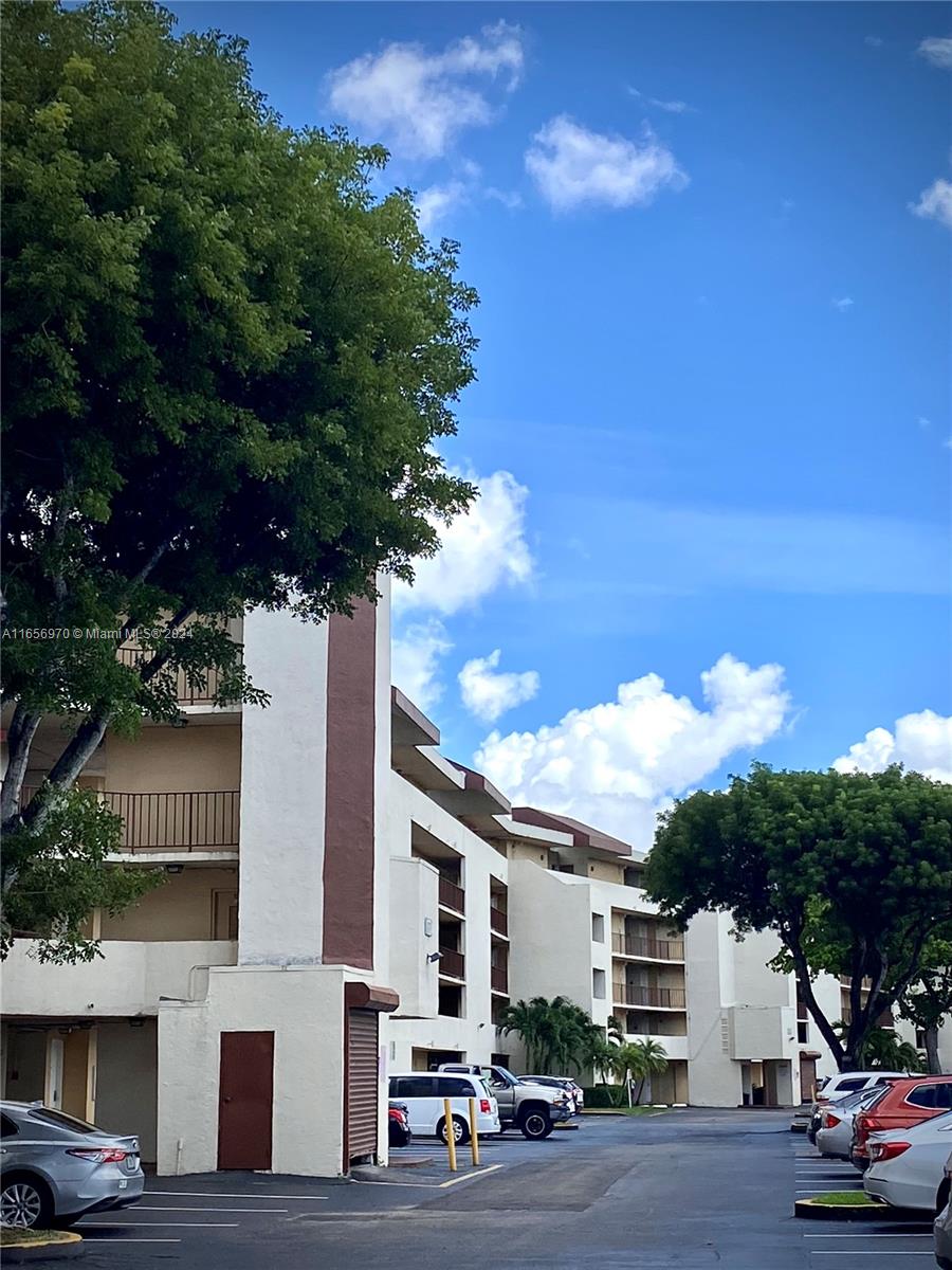 a front view of a building with street view