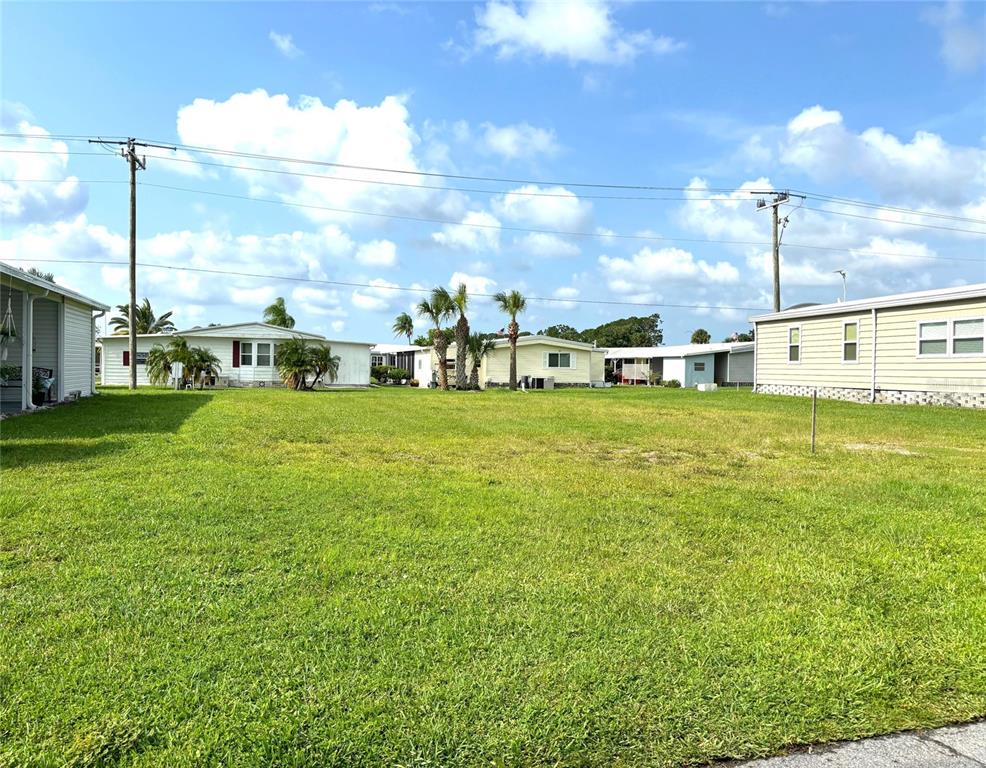 a view of a kids room with a big yard