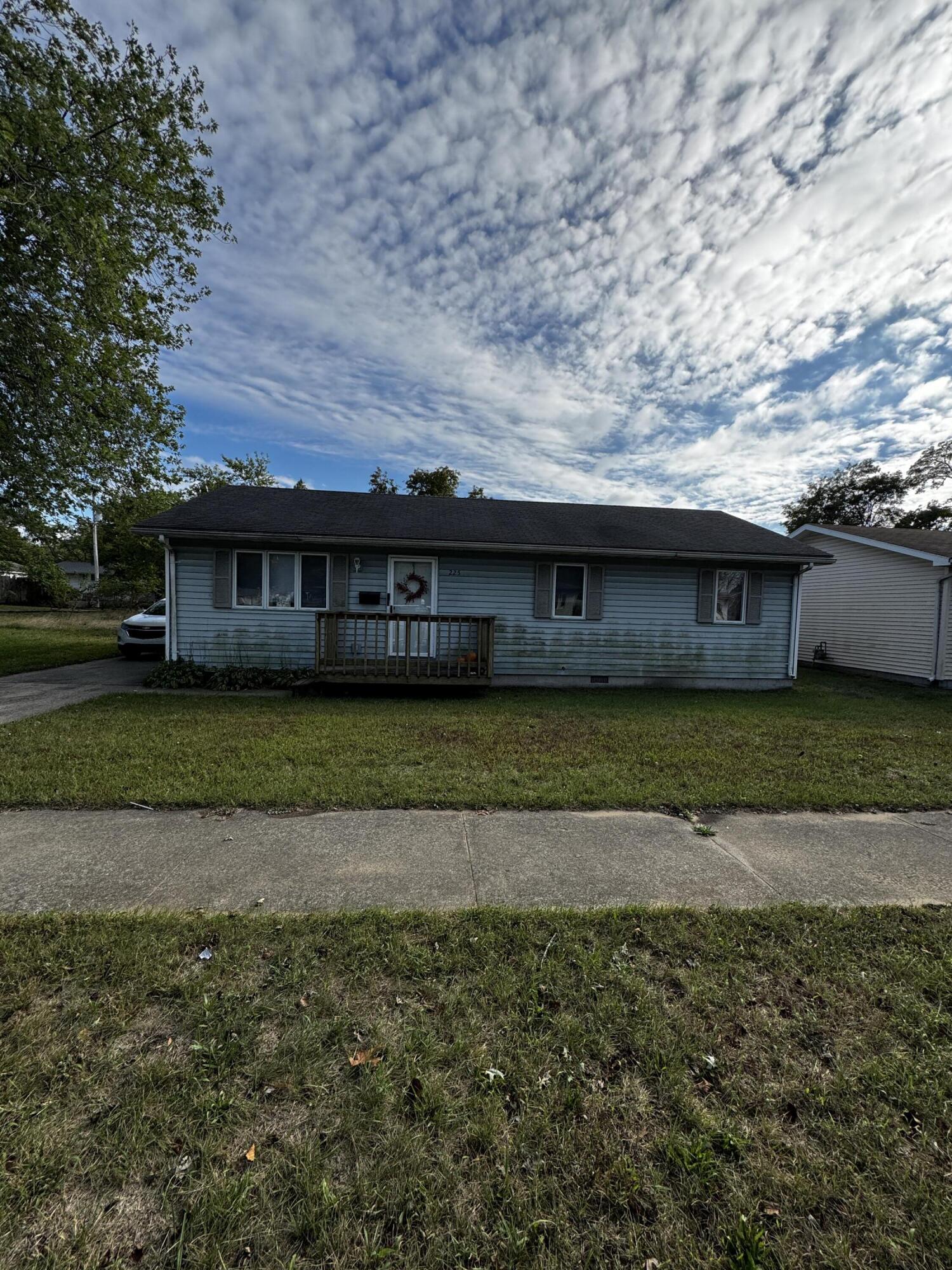 a view of house with outdoor space