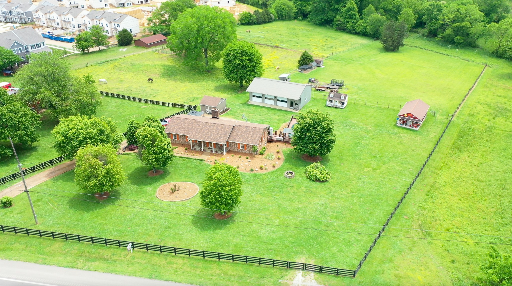 a view of a swimming pool with a yard