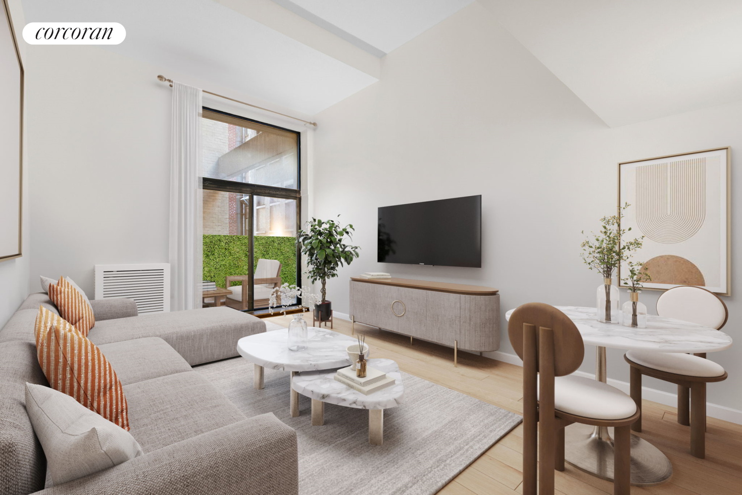 a living room with furniture and a flat screen tv