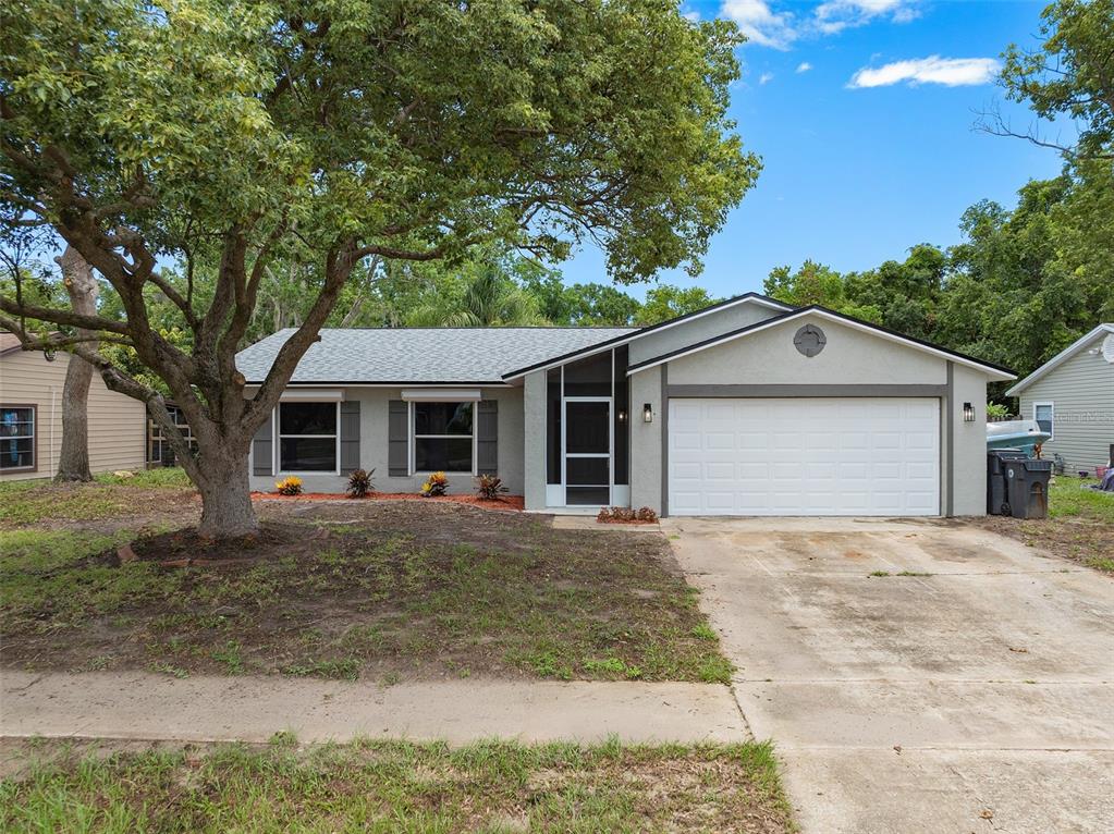 Charming and Inviting Front ExteriorThe front of the property at 1669 Saratoga Dr, Titusville, FL 32796, exudes curb appeal with its well-maintained landscaping and welcoming design. This single-family home is situated in a quiet neighborhood, offering a peaceful and attractive setting.