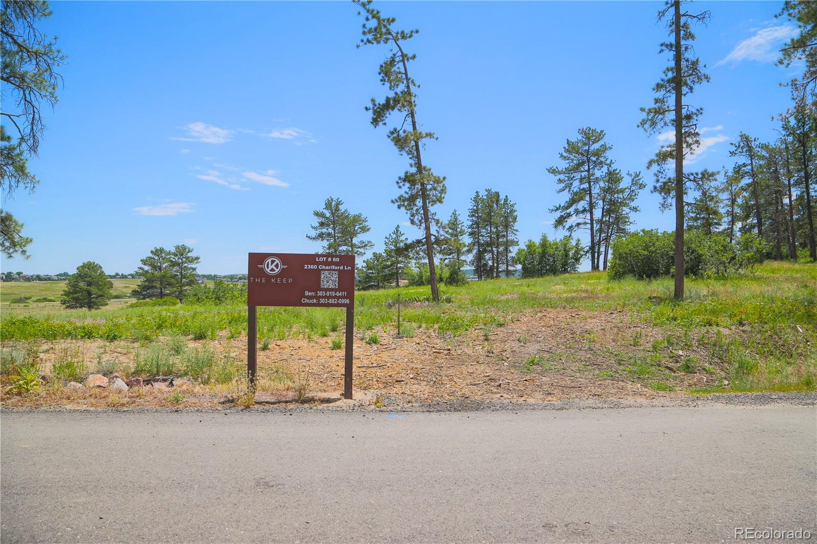 a sign board with street view