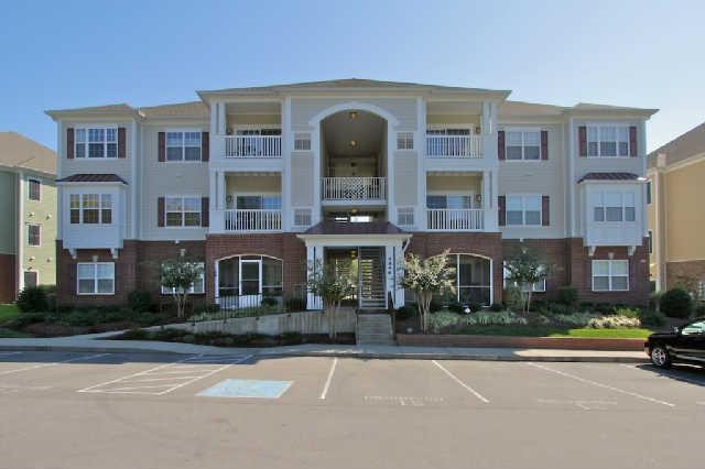 a front view of a building with street view