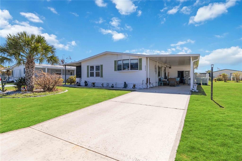 a house view with a garden space