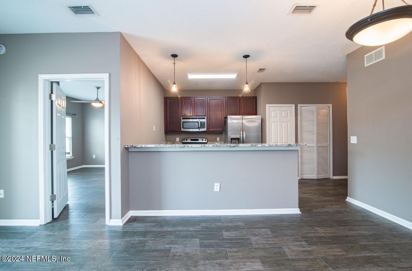 a view interior of a house and kitchen view